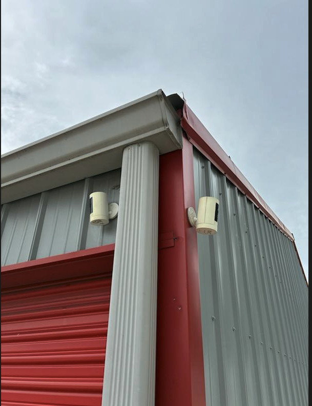 24/7 security camera mounted on a storage building